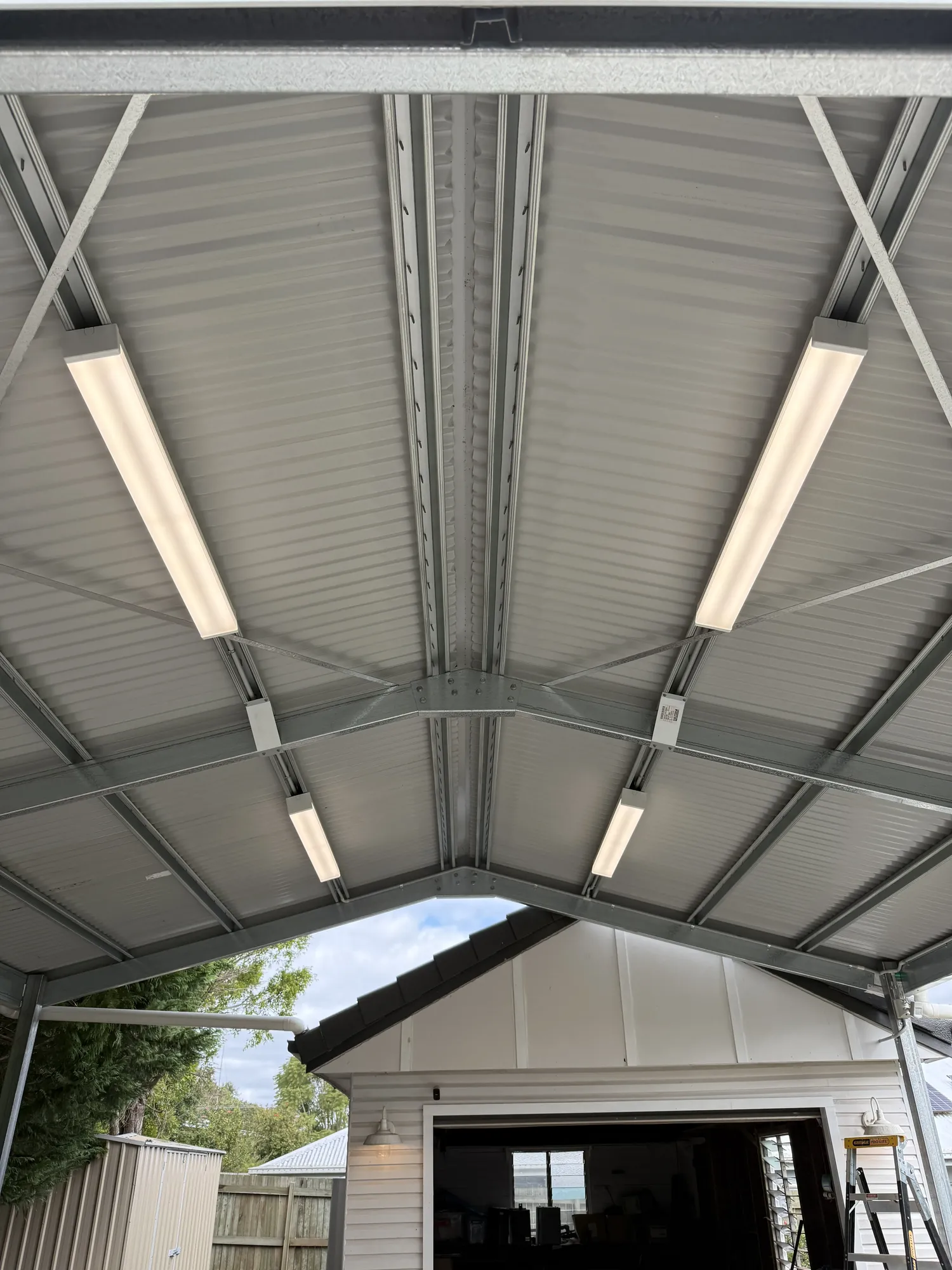 LED batten lights mounted on exterior shed wall
