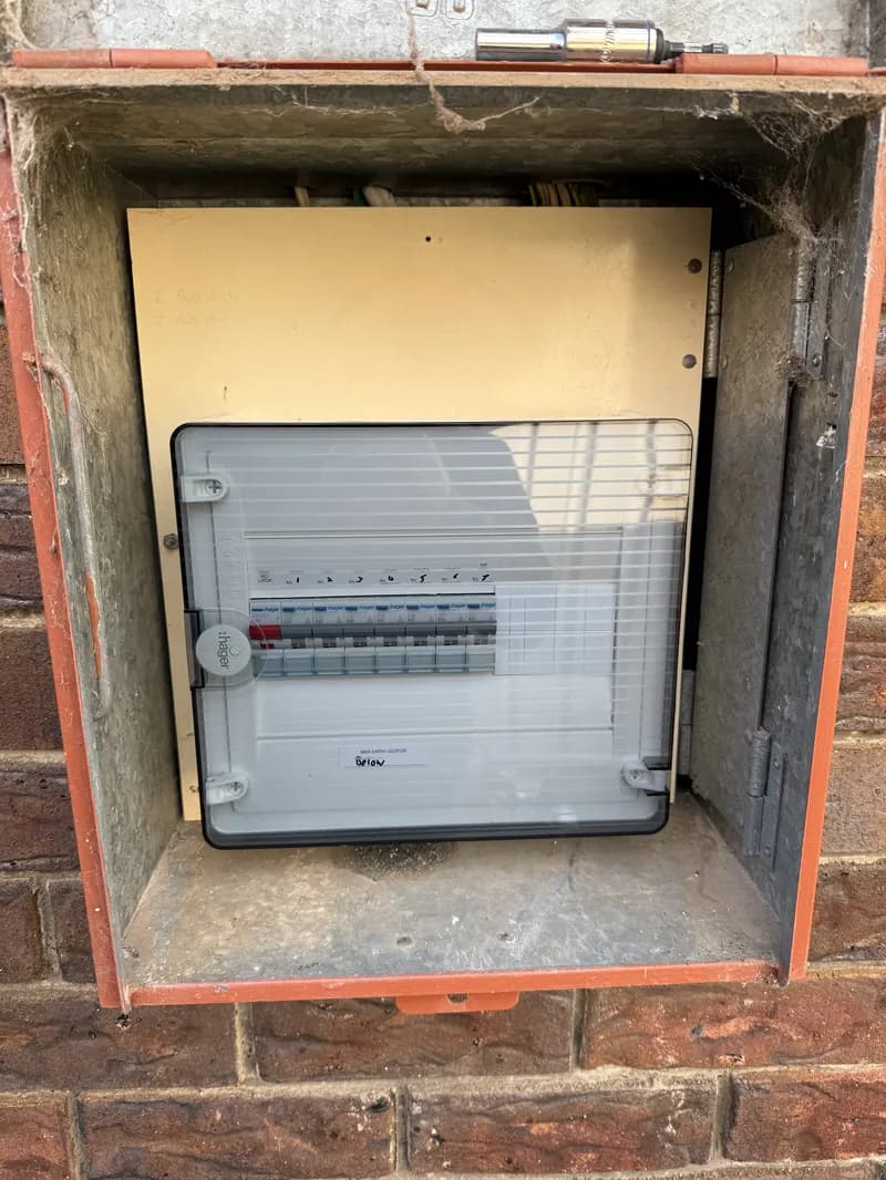 Hager switchboard upgrade in a residential brick meter box. Modern circuit breakers replacing old fuses for a Pittsworth property.